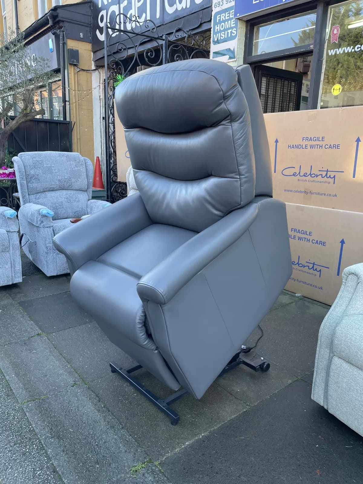 Celebrity Standard Size Hollingwel Riser Recliner Chair in Pewter Lena LEATHER — photograph 1