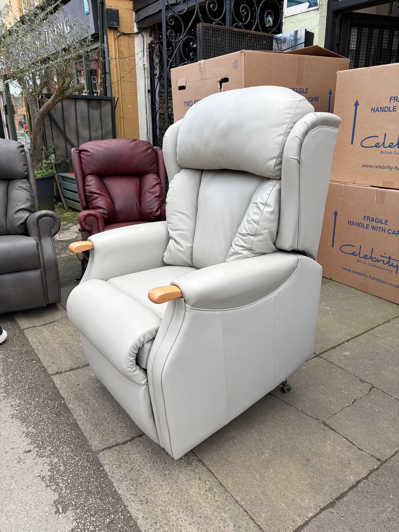 Canterbury Large Cloud Zero chair in Ascot Stone Grey leather, upright front view
