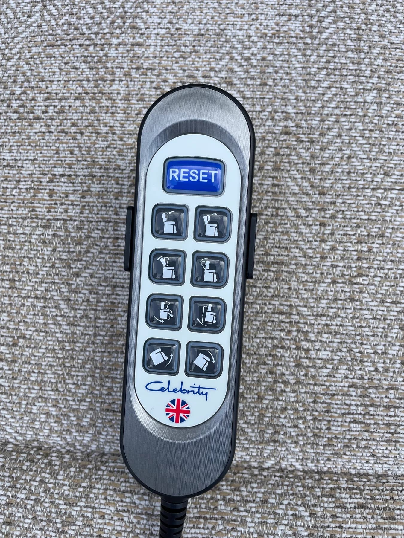 Close view of a Celebrity powered recliner handset with position controls
