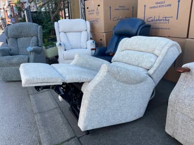 Westbury Standard Cloud Zero chair in Tidal Sand fabric, reclined three-quarter view with footrest raised