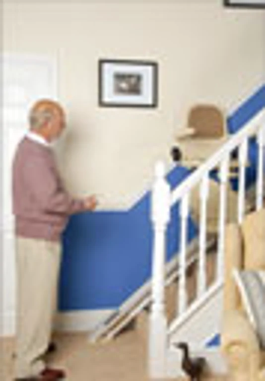 Brooks straight stairlift travelling on a staircase
